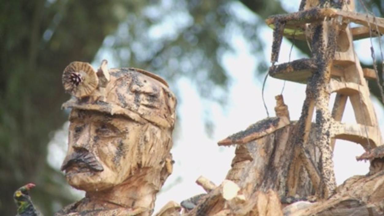 A close-up of a wood carving
Description automatically generated